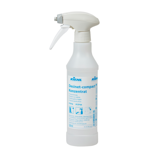 Abgebildet ist eine weiße 500 ml Trichterflasche mit der Aufschrift "Kiehl Desinet compact" der Johannes Kiehl KG, leer und mit 6 Schaumsprühern versehen, vor einem schlichten weißen Hintergrund. Die Packung enthält 6 Flaschen.