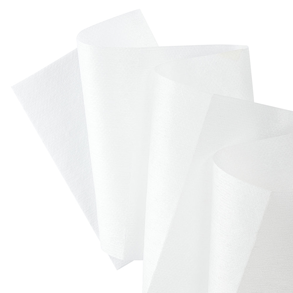 Three sheets of the white, textured WypAll® Wettask™ PowerClean nonwoven fabric from Kimberly-Clark GmbH are layered in curved layers against a solid white background. The product is delivered on 6 rolls with 120 sheets per refill pack, packaged in a box.