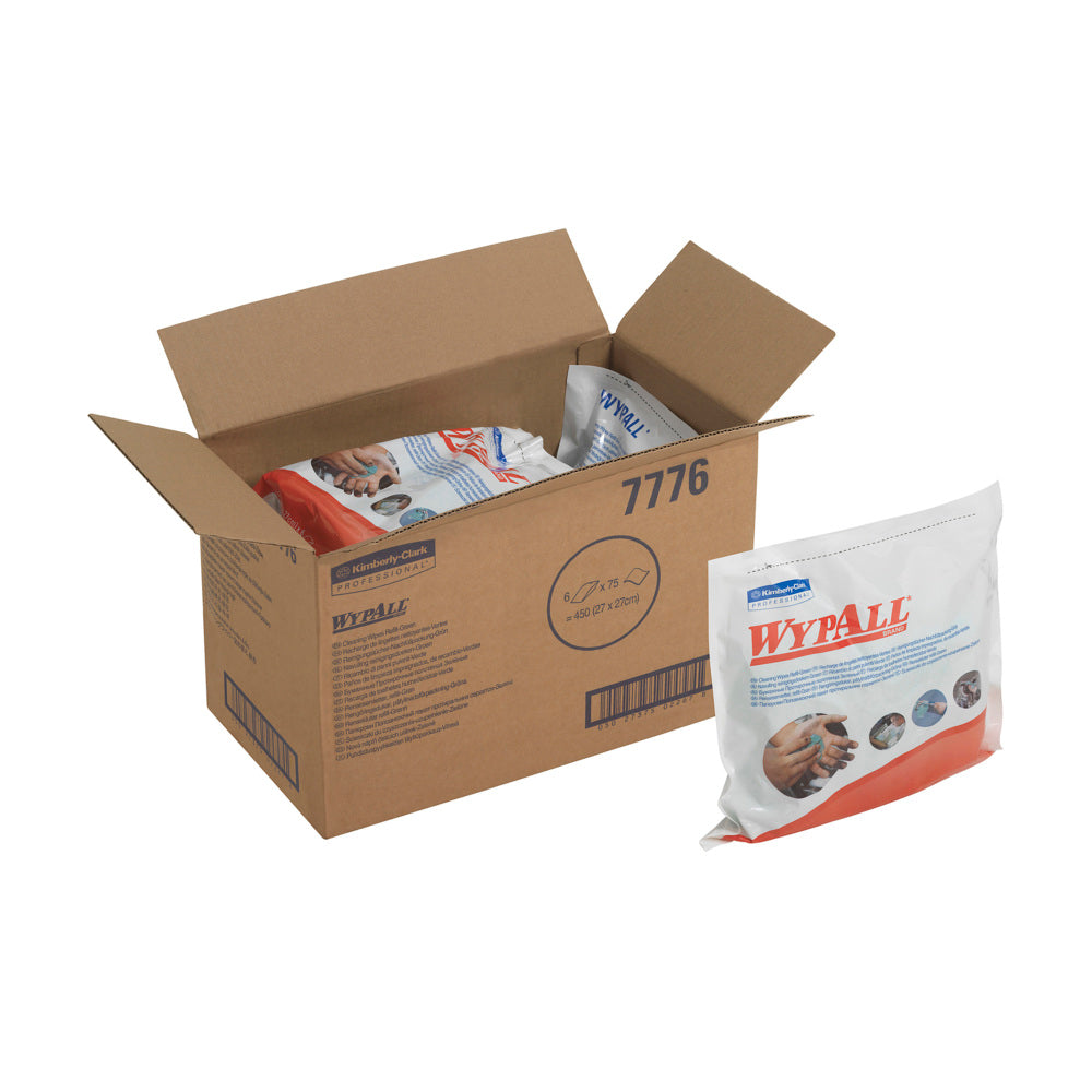 Eine offene Schachtel mit der Aufschrift "WypAll" der Kimberly-Clark GmbH enthält mehrere versiegelte Packungen WypAll® Wischtücher - Grün (6 Beutel x 75 Blatt). Auf der Außenseite einer Packung sind Branding und Bilder von Händen zu sehen, die die grünen Reinigungstücher benutzen.
