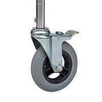 A close-up of the Novocal PU-foamed wheel for multipurpose carts, 150 mm diameter, with a metal housing and brake lever. This wheel is part of a set (2 swivel wheels, 2 stop wheels) and is attached to a metal rod.