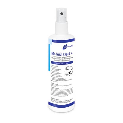 A white plastic spray bottle labeled "Meditrade Medizid Rapid+" by Meditrade GmbH on a plain background, with blue text and health-related symbols indicating a medical disinfectant for quick disinfection.