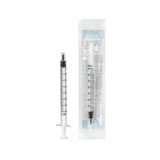 A 1-ml Mediware insulin syringe from Servoprax GmbH is shown next to its packaging. The syringe has a transparent barrel with black measurement markings, including U 40 graduations, and a black plunger. The transparent packaging features text highlighting the Luer lock connector for easy attachment.