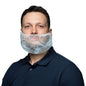 A man in a dark polo shirt with a transparent, nonwoven fabric beard mask (NITRAS beard mask large) attached to his face looks directly into the camera against a light background.
