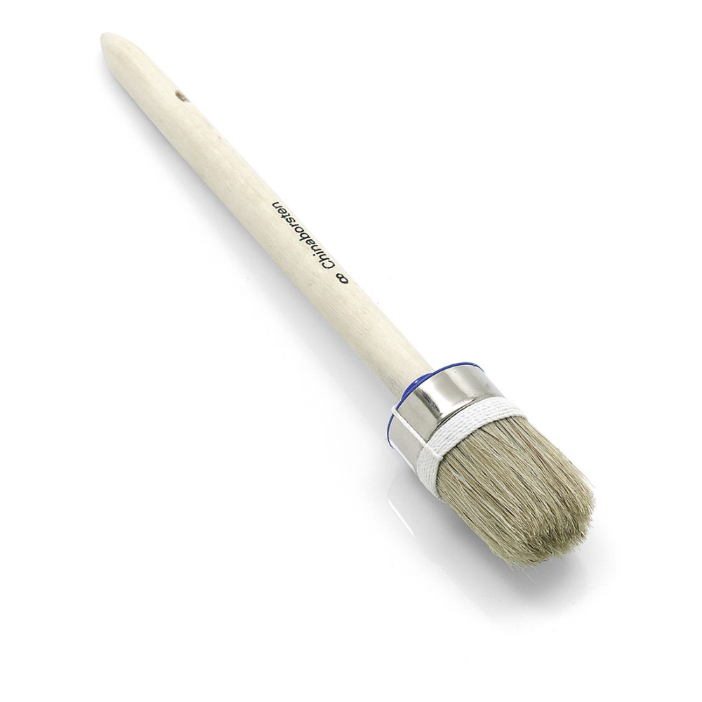 The Nölle Profi Brush industrial round brush features a durable natural bristle mix, a tapered handle made of light wood, and a secure silver metal ferrule, thus offering top industrial quality.