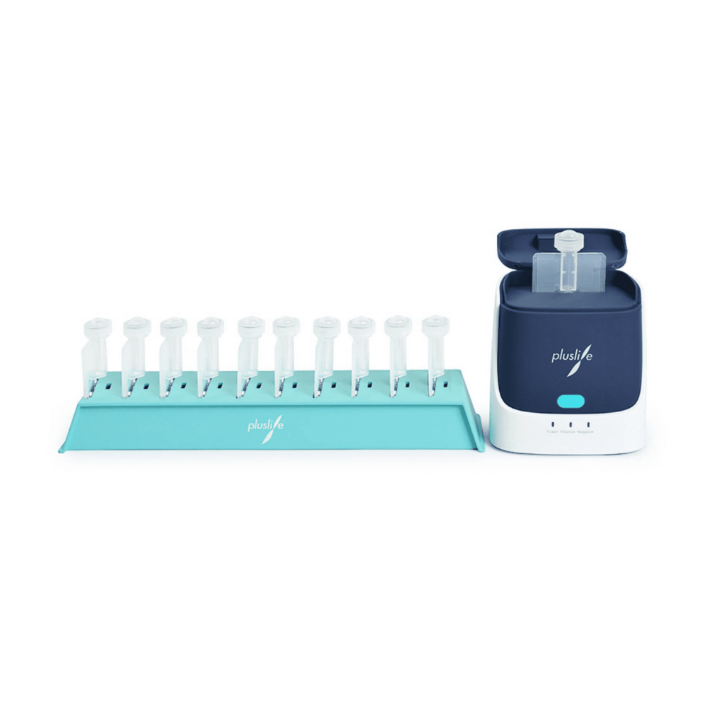 A compact, modern Pluslife breast pump setup with a blue-white electric pump unit next to a blue-green base holding several white collection bottles for point-of-care tests.