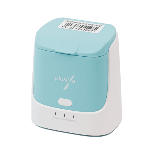 The PlusLife Integrated Nucleic Acid Test Device (Vet Version) is compact and light turquoise with a white lid and the “PlusLife” logo. It features three indicator lights (Power, Positive, Negative) and a barcode label on the top. Package contains 1 unit.