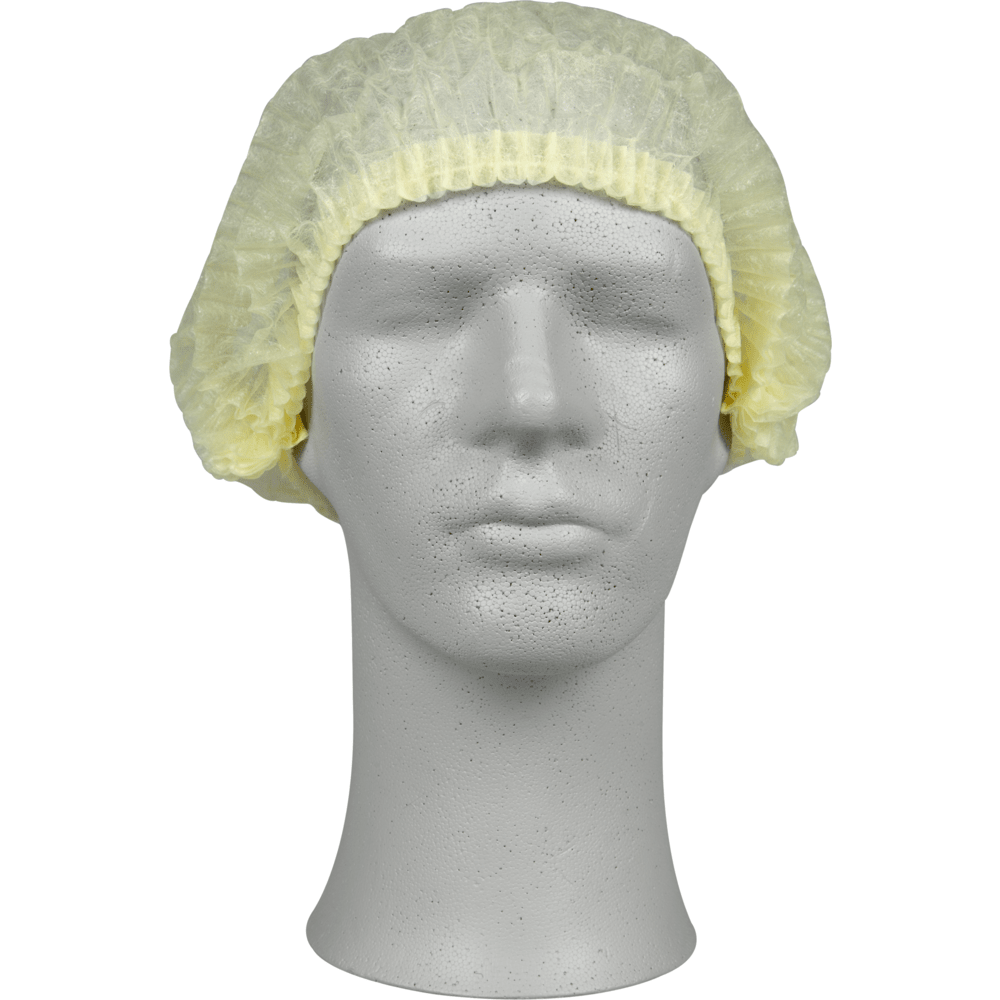 On a gray mannequin head is a light yellow clip cap, PP from Abena Re-Seller GmbH, which provides hygienic protection for the medical or gastronomic field. The disposable cap covers the top and sides of the head.