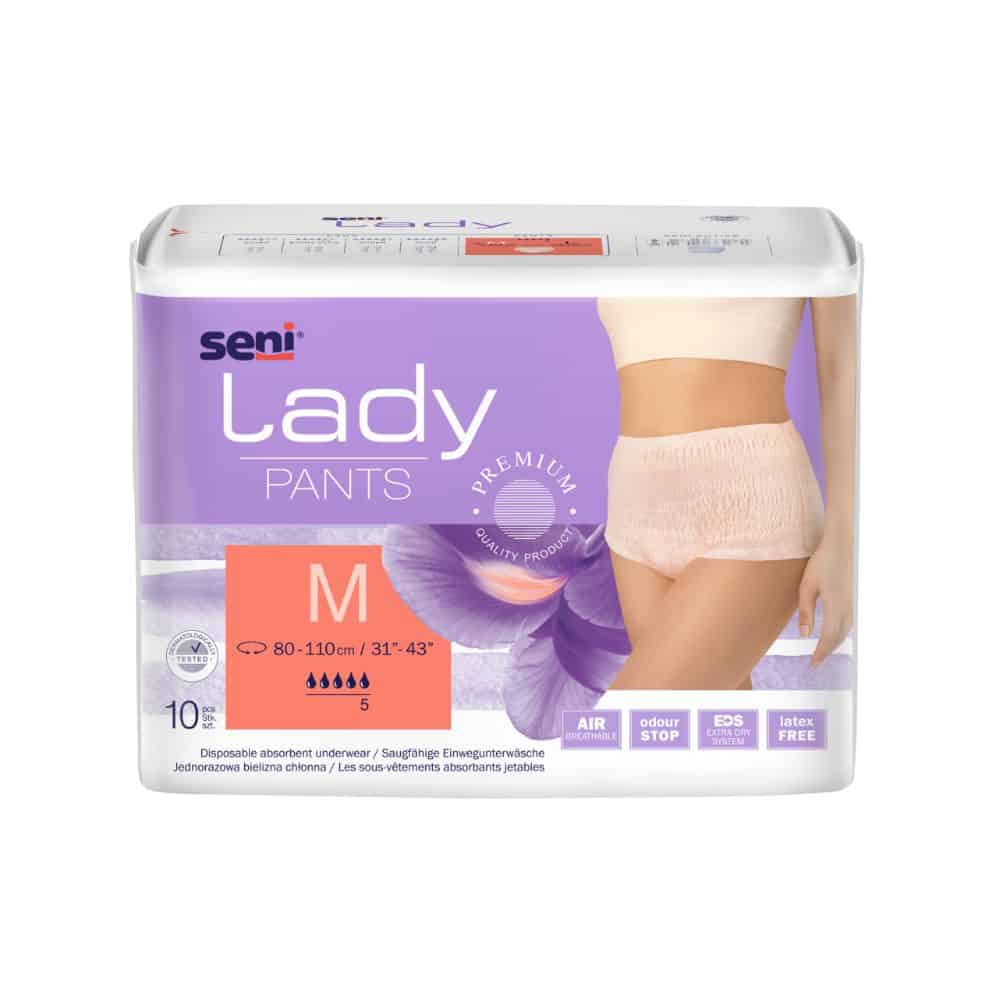 A package of the absorbent underwear Seni Lady Pants in size Medium, developed for incontinence, shows an image of the product on a female model. The packaging highlights features such as breathability and security. The product is from TZMO Deutschland GmbH.