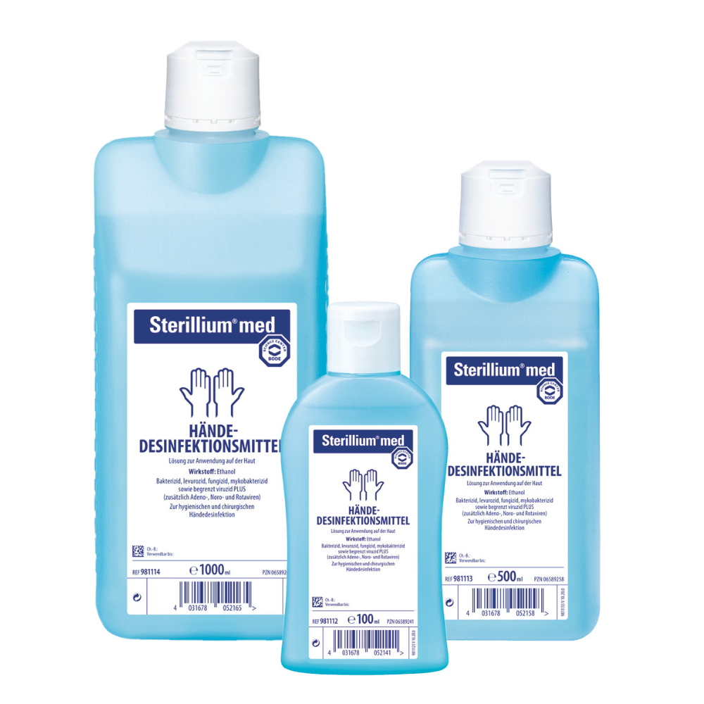 Three bottles of Sterillium® med hand disinfectant based on ethanol in different sizes with German labeling. The bottles are translucent blue with white caps and labels with medical symbols. The product is manufactured by Paul Hartmann AG.