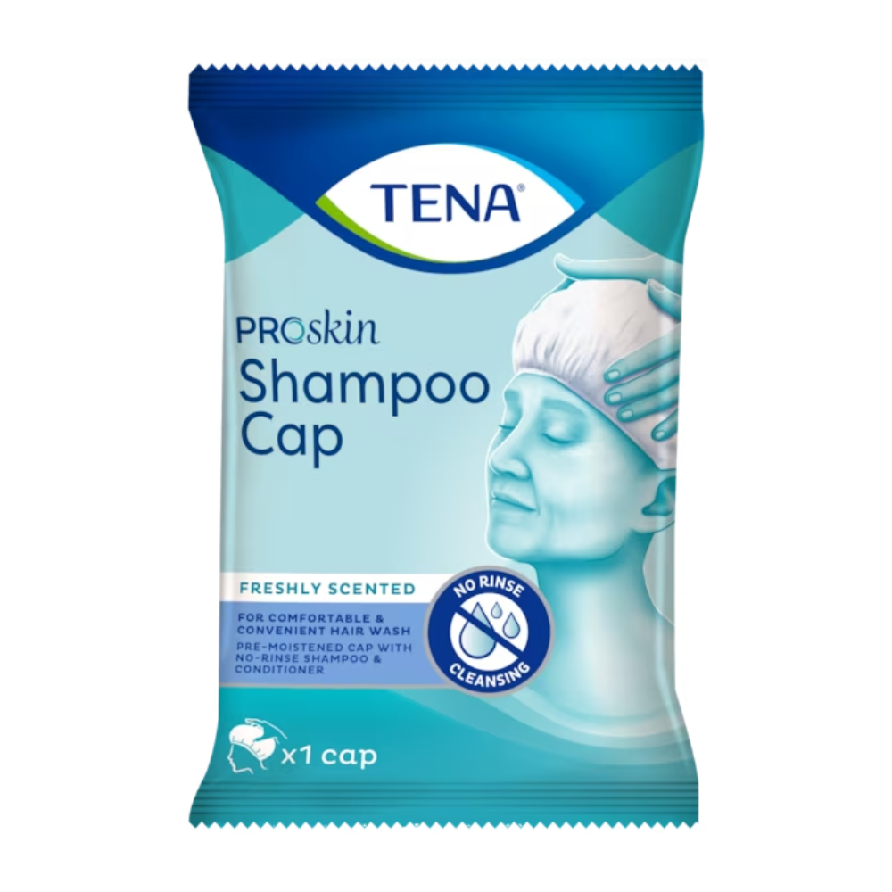 The TENA ProSkin Shampoo Cap wash cap from TENA - Essity Germany GmbH is presented in packaging with a blue and white design, featuring a person using this disposable cap. The text emphasizes "Freshly scented", "Cleansing without rinsing" and includes both "Shampoo and conditioner". Contains one cap.