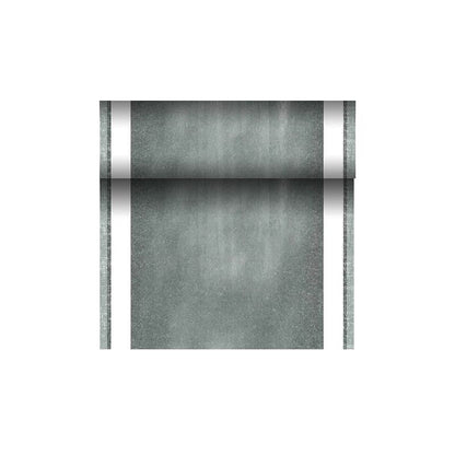 A roll of fabric-like green table runner from the PAPSTAR table runner PV-Tissue Mix "ROYAL Collection" with clean white edges is partially unrolled against a simple white background. This product, manufactured by PAPSTAR GmbH, has a slightly weathered appearance due to its unique composition of pulp-viscose-tissue mix.