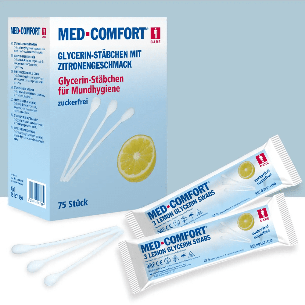 The image shows a box of Top-Comfort PP lemon sticks with lime flavor for oral care from AMPri Handelsgesellschaft mbH. The box contains 75 pieces and shows the text in German. On the front of the box, there are also two individually wrapped swabs and two unpackaged sticks with lime flavor depicted.