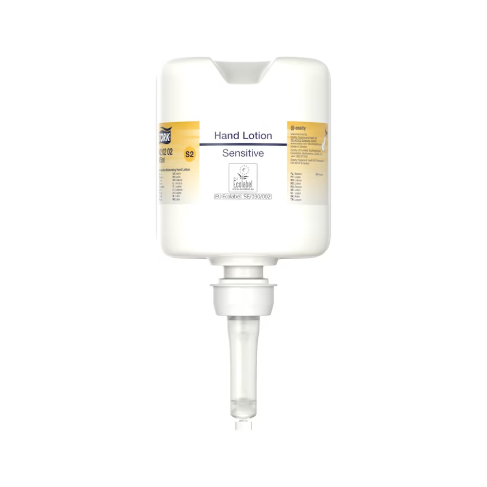 A Tork 420202 hand lotion dispenser in white with a transparent nozzle and the inscription "Sensitive Moisturizing Hand Sanitizer" in small print offers a minimalist design that focuses on dispensing moisturizing lotion, perfect for caring for sensitive skin.