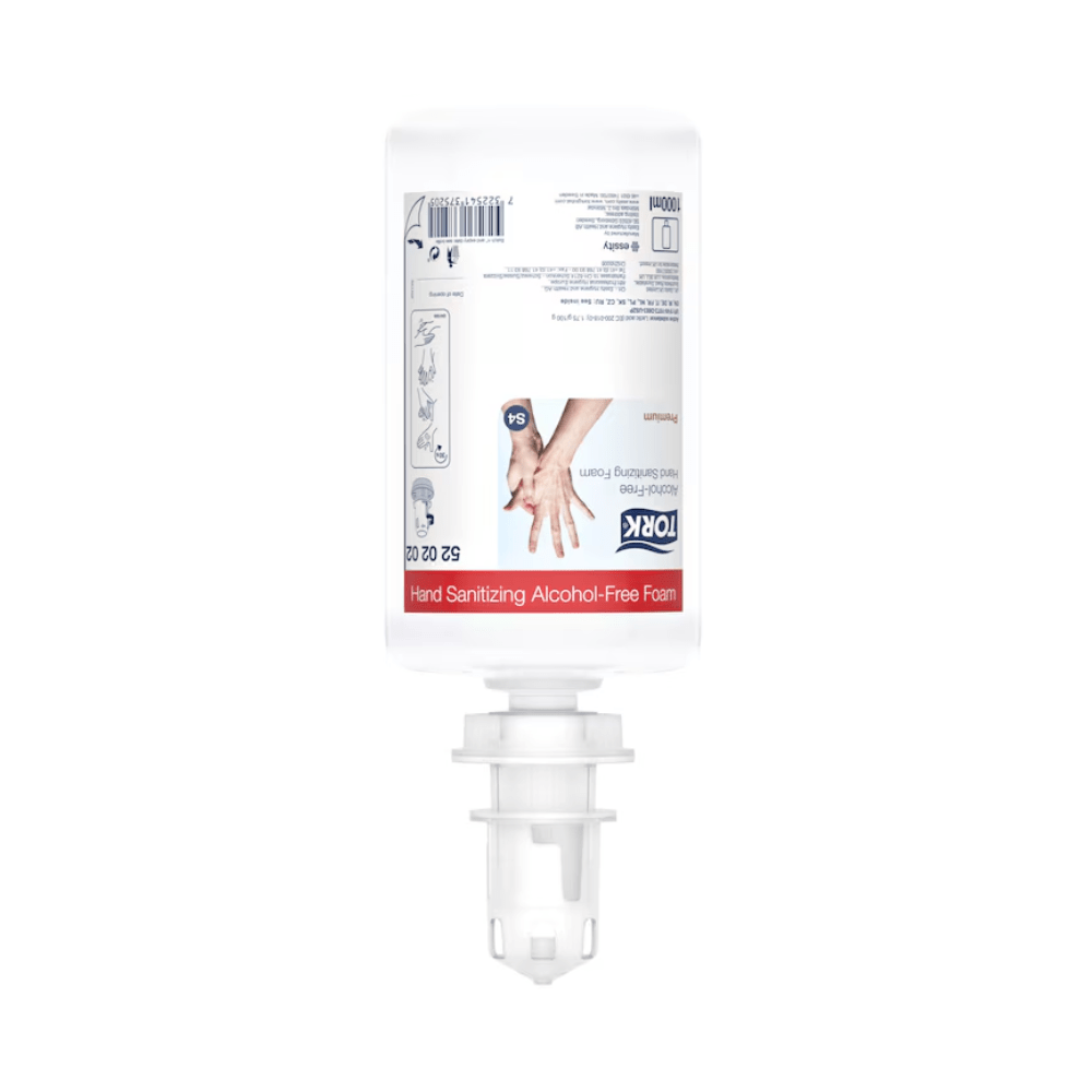 A transparent and white bottle of Tork 520202 alcohol-free hand sanitizing foam Premium S4 from TORK – Essity Professional Hygiene Germany GmbH. The bottle is inverted and equipped with a dispensing nozzle to promote sustainable hand hygiene. The label contains instructions for use and product details in multiple languages.