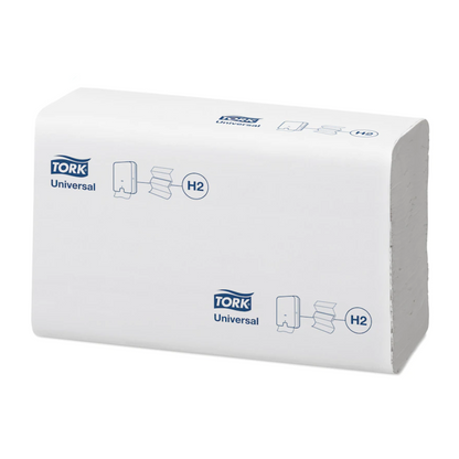A stack of Tork Xpress® 150299 Multifold Hand Towels, wrapped in white packaging, displays the Tork logo and illustrations. The packaging emphasizes their compatibility with dispensers and offers, as part of the TORK range - Essity Professional Hygiene Germany GmbH, an impressive value for money.