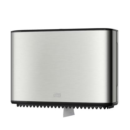 An elegant Tork Xpress® 460006 wall-mounted dispenser for mini-jumbo toilet paper in an elegant stainless steel design. A portion of the toilet paper is visibly protruding from the bottom, perfect for modern toilets. The brand name "TORK" by Essity Professional Hygiene Germany GmbH is subtly printed on the front, adding a touch of sophistication to the whole.