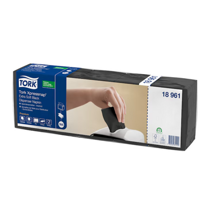 The image shows a package of the Tork Xpressnap® 15850 Extra Soft Dispenser Napkin N4 2-ply and emphasizes its premium quality. A photo shows a hand skillfully pulling a napkin from the dispenser, which is intended to reduce napkin consumption. The packaging contains information about eight packs per box and is associated with the TORK – Essity Professional Hygiene Germany GmbH brand.