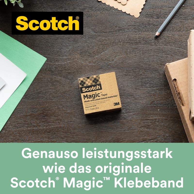 A box of Scotch® Magic™ Tape by 3M Deutschland GmbH (19 mm x 33 m, 9 rolls/pack, with 66% plant-based adhesive) lies on a wooden table next to green and white paper, a notebook, and a pen - perfect for eco-conscious office supplies.