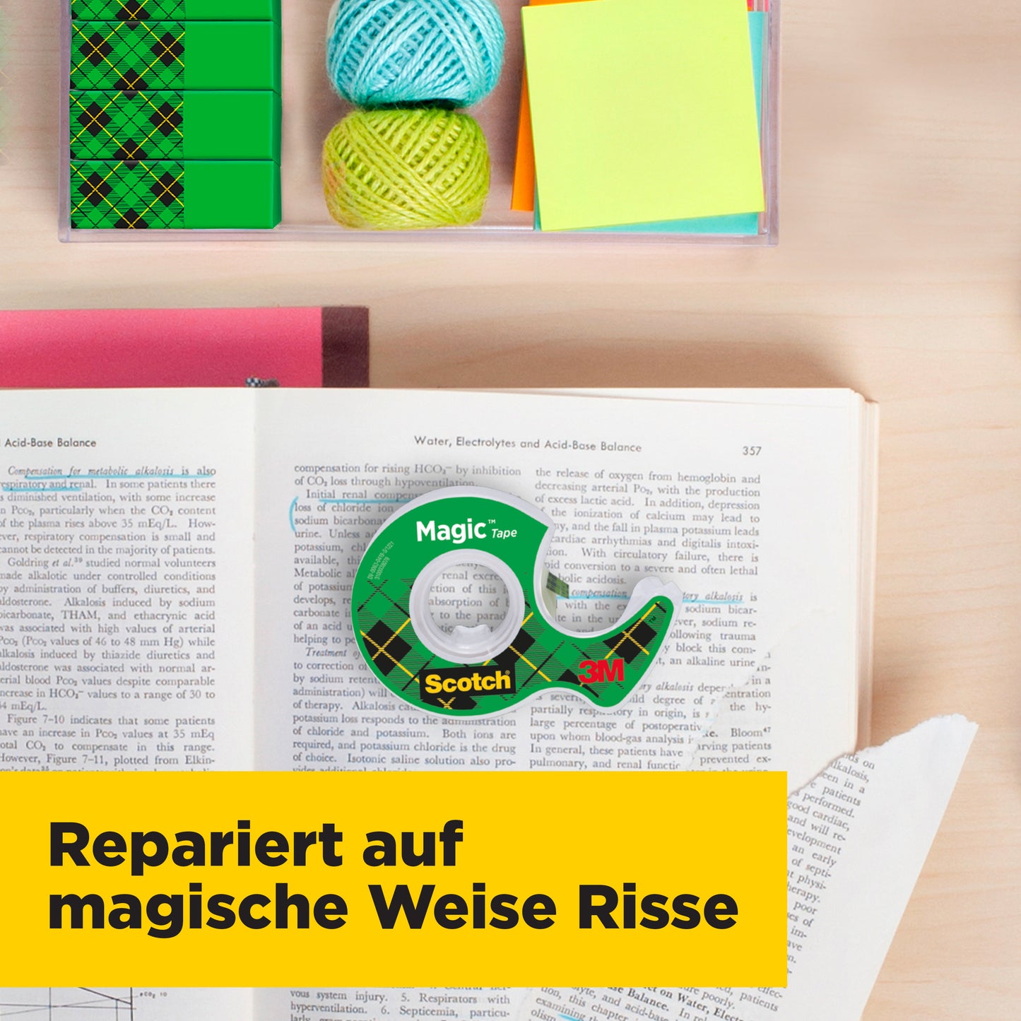 A Scotch® Magic™ Invisible Tape (19 mm x 25 m) from 3M Deutschland GmbH lies on an open textbook, surrounded by colorful yarn, sticky notes, and a closed notebook. A yellow banner emphasizes: "Magically repairs tears.