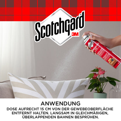 A hand sprays Scotchgard™ Textile Protector Spray, 400 ml from 3M Deutschland GmbH onto a striped cushion on a gray sofa, providing protection against dirt and stains. A green plant is nearby; the German instructions are visible at the bottom.