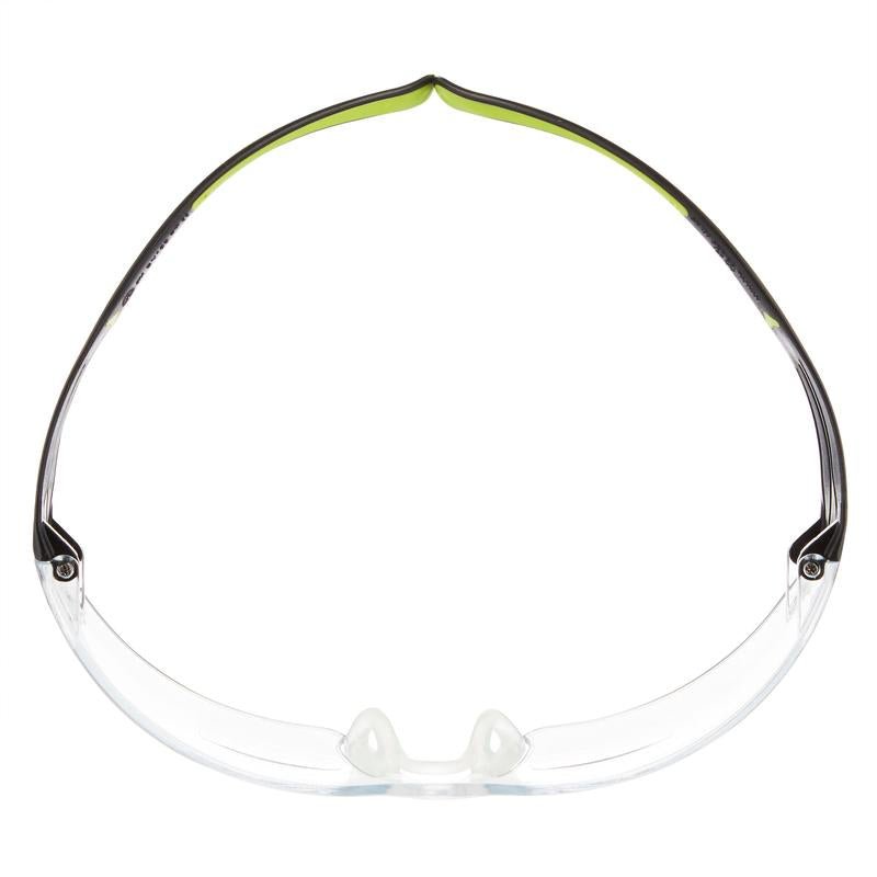 The 3M™ SecureFit™ reading safety glasses from 3M Deutschland GmbH have clear protective lenses, a black-green frame, and a nose bridge, viewed from above on a white background.