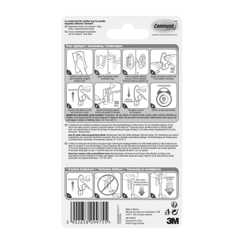 The back of a Command™ Clothes Hook, 17019-FGN package from 3M Deutschland GmbH shows a pictorial step-by-step guide for wall mounting without drilling, warnings, product details, the barcode, and the 3M logo in black and white.