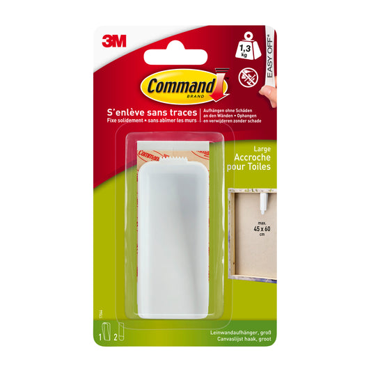Eine Packung Command™ Leinwandaufhänger von 3M Deutschland GmbH, mit einem großen Aufhänger und Klebestreifen aus klarem Kunststoff auf grünem und rotem Untergrund mit Anleitung und Angaben zur Gewichtsbegrenzung.