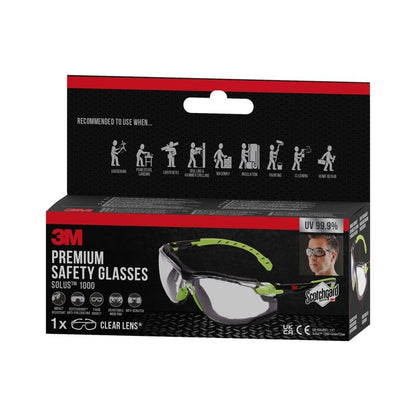 A box of 3M™ Solus™ Safety Glasses 1000 with clear lenses, with Scotchgard™ Anti-Fog Coating and attachable foam gasket, from 3M Deutschland GmbH. The packaging shows product information on a black and red background.