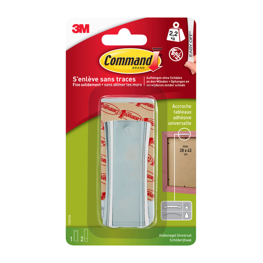 Eine Packung Command™ Bildernagel 17047 von 3M Deutschland, silber, enthält 1 Haken (hält bis zu 2,2 kg) und 2 große Streifen; französischer und deutscher Text informiert über beschädigungsfreies Aufhängen von Rahmen.