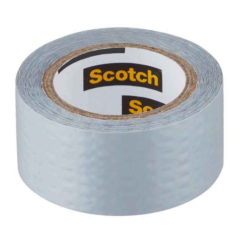 A roll of Scotch® Extremium™ Universal Tape, 3 m x 19 mm from 3M Deutschland GmbH, with a textured silver surface and visible "Scotch" lettering on the cardboard core, stands upright on a white surface.