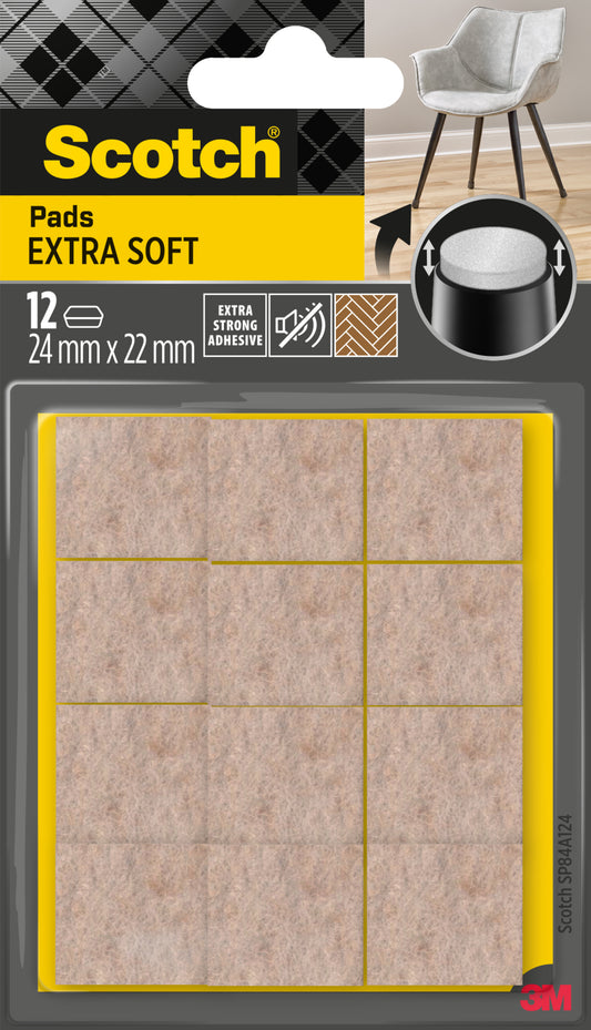 Eine Packung mit 12 Scotch® Extra weiche Filzpads SP84A24 von 3M, selbstklebende beige Filzpads (24 mm x 22 mm) in durchsichtiger Verpackung. Das Etikett hebt ihren extrastarken Klebstoff hervor.