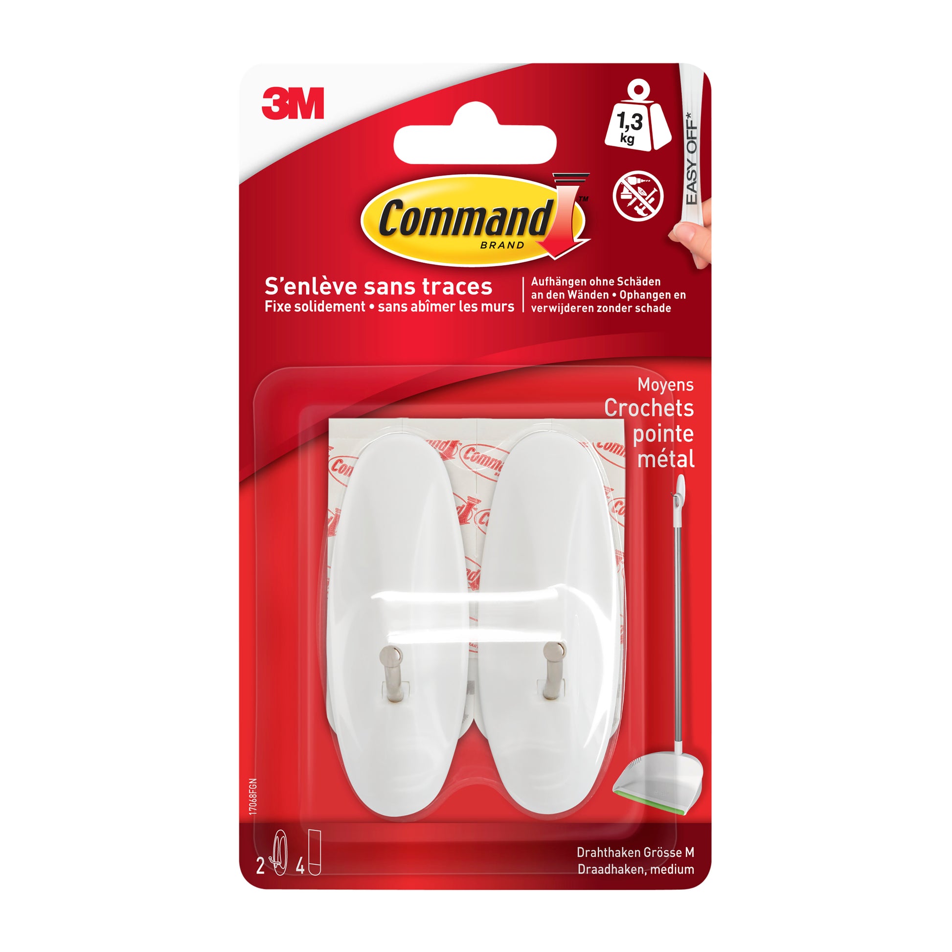 Eine Packung 3M Command™ Medium Drahthaken (17068) der 3M Deutschland GmbH enthält einen Haken; die Verpackung ist rot-weiß, zeigt den Haken und gibt auf Französisch und Englisch an, dass er bis zu 1,3 kg hält und sich sauber entfernen lässt.