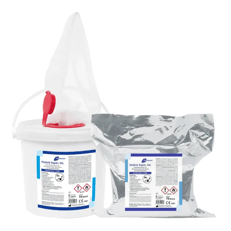 A white plastic bucket with a lid and spout, and a sealed silver pouch, both labeled "Meditrade Medizid® Rapid+ disinfectant wipes" with hazard symbols and the text "quick disinfection" from Meditrade GmbH.